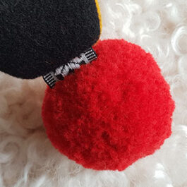 Produktbild: En röd pompom boll